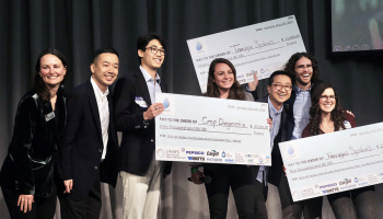 Seven individuals smiling on a stage while holding three large checks Caption:Prize winners and organizers at the 2024 MIT Water, Food, and Agriculture Innovation Prize night event, co-sponsored by J-WAFS. Credits:Photo: Jiaqi Zhang