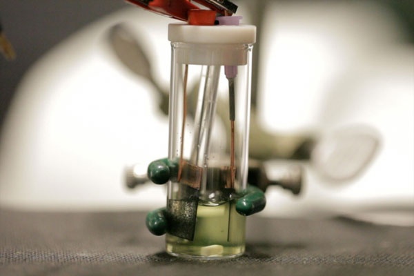 Vial with electrical source and chemically treated electrodes