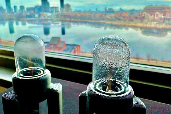 two water harvesting devices on a window sill