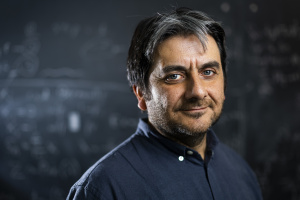 A portrait of Cem Tasan