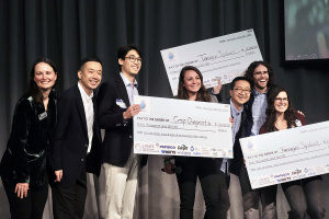 Seven individuals smiling on a stage while holding three large checks Caption:Prize winners and organizers at the 2024 MIT Water, Food, and Agriculture Innovation Prize night event, co-sponsored by J-WAFS. Credits:Photo: Jiaqi Zhang